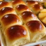 Freshly baked Hawaiian Rolls served on a platter.